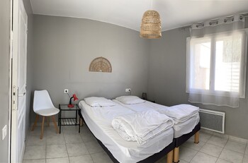 cap1 ch ©deux lits en 80 x 200 ou un couchage unique en 160